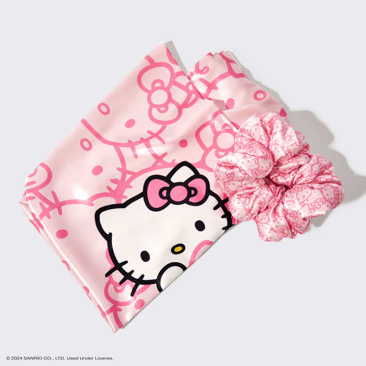 Hello Kitty x Kitsch – 2-teiliges Set mit Satin-Kissenbezug und Kissen-Haargummi