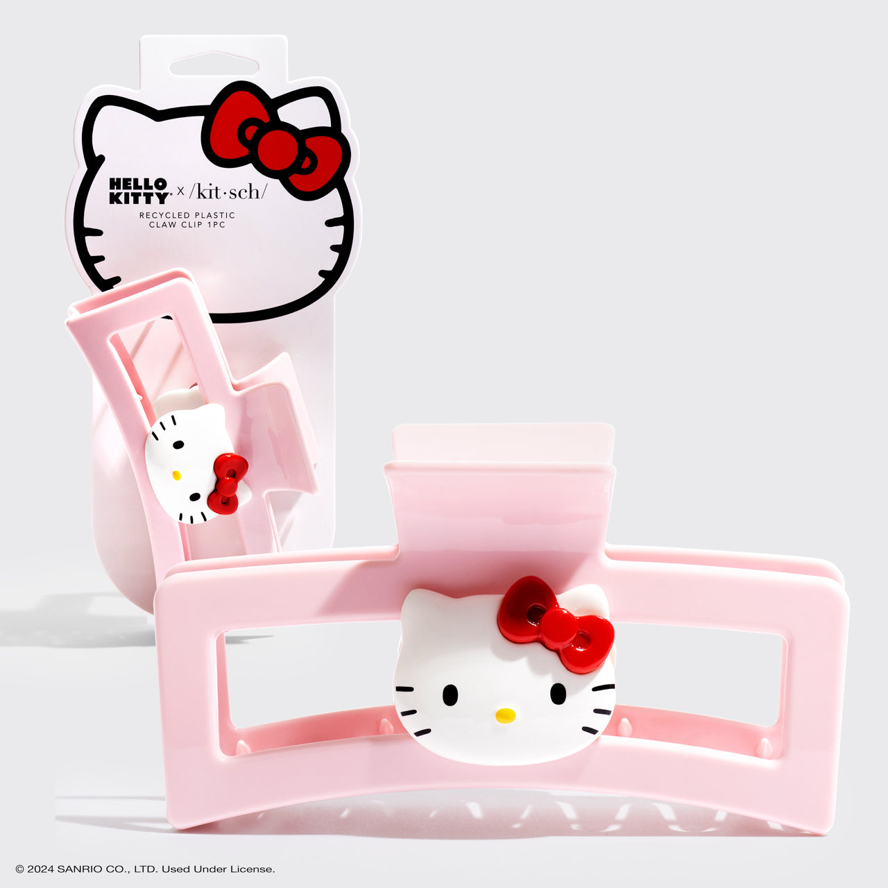 مشبك مخلب مفتوح الشكل من البلاستيك المعاد تدويره من Hello Kitty x Kitsch، قطعة واحدة - وجه Hello Kitty